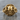 Gothic Scroll Skull Ring, gold vermeil, front view on stone surface