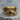 Jawless Skull Band Ring, gold vermeil, product photo on stone surface
