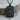 Norse Knotwork Wolf Pendant, black rhodium, front view on wood base
