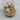 Sun and Moon Faces Pendant, gold vermeil, product photo on wood surface