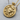 Scorpio Zodiac Medallion Pendant, gold vermeil, angled view on wood surface with chain