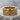 Celtic Knot Lion Ring, gold vermeil, front view on stone surface