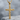 Dimpled Texture Cross Pendant, gold vermeil finish, front view on stone