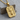 Dragon Tablet Pendant, gold vermeil, product photo on wood surface