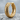 Dragon Scale Hoop Earring, gold vermeil, front angle on stone surface
