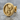 Rising Phoenix Stud Earring, gold vermeil, angled front view on stone