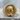 Virgin Mary Profile Ring, gold vermeil finish, front view on stone surface