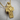 Saint Michael Serpent Pendant, gold vermeil, product photo on wood surface