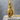 Skull Grenade Pendant, gold vermeil, product photo on stone