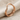 Contour Wire Arch Ring, rose gold, product photo on fabric