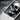 Hammered Skull Money Clip, oxidized, close-up of skull relief and texture