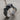 Wrap Owl Ring, oxidized matte finish, product photo on wood