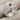 Garnet Fourfold Puzzle Ring in polished silver, studio product photo