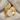 Draped Volute Open Ring, gold vermeil, angled front view