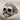 Baroque Skull Ring, oxidized silver product photo on textured fabric