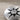 Compass Star Earring, oxidized, close-up of engraved star and stone