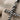 Twisted rope cross pendant, oxidized, close-up of twisted cable details