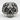 Scroll skull ring, oxidized silver, angled three-quarter view
