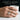 Kanso Single Trace Ring — 18K Gold Vermeil worn on model hand outdoors