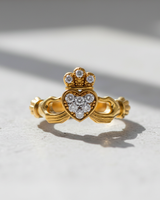 Front view of 14K gold vermeil Silver Claddagh Ring featuring pave set stones in heart and crown design