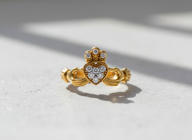 Front view of 14K gold vermeil Silver Claddagh Ring featuring pave set stones in heart and crown design