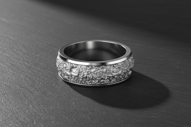 Side angle of the handcrafted silver lunar crater ring, showcasing the high-contrast texture against the smooth, polished comfort-fit edges.