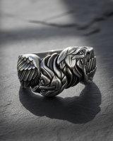 Front view of 925 sterling silver double eagle ring with oxidized finish and bold relief design