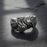 Front view of handcrafted 925 sterling silver double headed eagle ring with detailed feathers on dark stone background