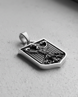Side perspective of German Federal Eagle pendant showing polished bail and sturdy sterling silver construction
