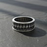 Oxidized sterling silver dragon scale ring with intricate detailing and darkened patina for gothic style men's jewelry
