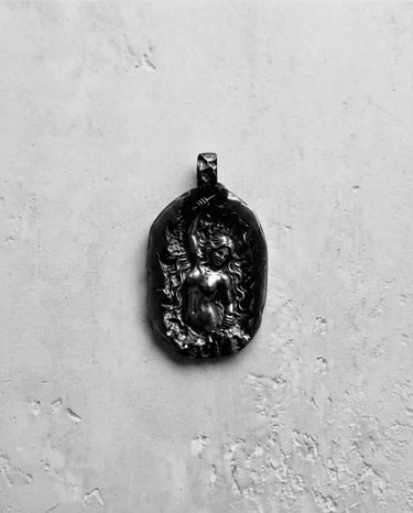925 sterling silver self made woman pendant featuring a female figure carving herself from stone