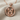 Facing Gemini Twins Pendant, rose gold, product photo on textured linen