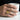 Rearing Horse Signet Ring, gold vermeil, worn on model hand holding a cup
