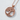 Maiden Tree of Life Pendant, rose plated silver, angled view on white surface