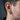 Side angle of men's silver huggie earring showing interlocking chain pattern and oxidized detail