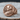 Napoleon Bonaparte Signet Ring, front three-quarter view on wood