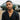 Side profile of oxidized 925 sterling silver wolf head pendant showing open mouth detail