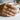 Eternity Kanji Disc Ring worn on model hand holding a white mug