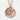 Japanese peace kanji pendant, rose gold plated finish on white textured background
