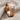 Hexagonal moon crater ring, rose plated silver, angled view on fabric