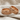 Nordic Bird Ring in rose gold finish, pair resting on linen fabric