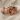 Screaming Wall Ring, rose gold, product photo on textured linen