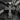 Angled view of the Orthodox cross design highlighting the detailed three-bar structure and religious inscriptions