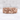 Skull Snake Rose Ring, rose gold, product photo on stone surface