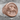 Persian Lion and Sun Ring, rose gold, angled view on stone