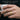 Lucky 13 Scroll Ring, gold vermeil, worn on model hand holding a coffee cup