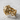 Honeycomb Bee Ring in gold vermeil, angled product photo on textured surface