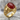 Carnelian Skull Ring, gold vermeil, product photo on stone surface