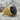 Masonic Black Onyx Ring, gold vermeil, three-quarter profile on rock surface