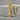 Kintsugi broken bar pendant, gold vermeil, on stone block